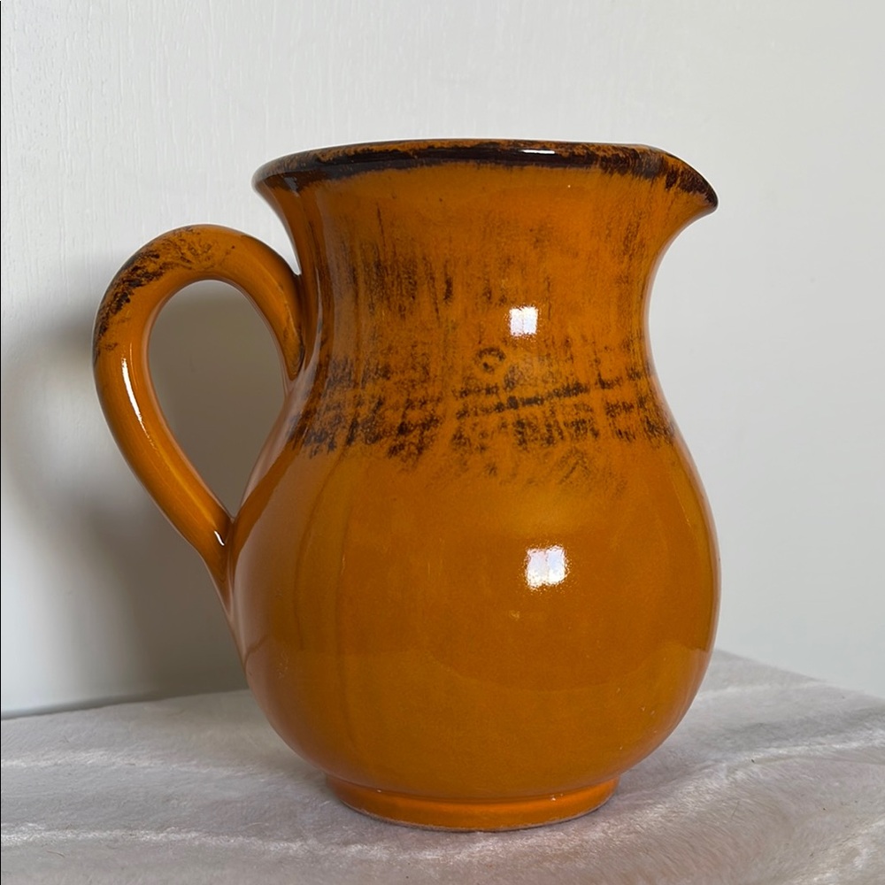Rich Orange Ceramic Pitcher with Curved Handle